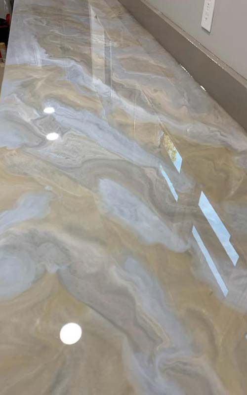 beautiful epoxy swirl in kitchen countertop