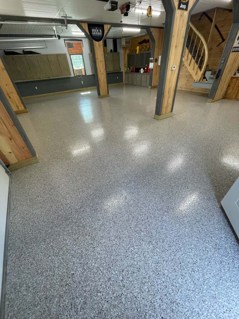 After epoxy floor installation in large garage